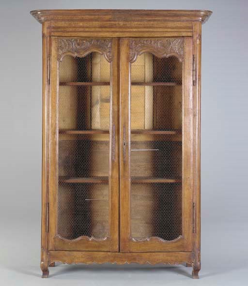A LOUIS XV PROVINCIAL BEECHWOOD AND OAK ARMOIRE,