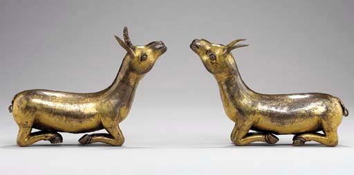A Pair of Gilt Copper Repoussé Deer