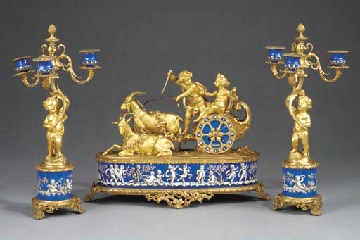 A Napoleon III gilt-bronze and porcelain clock garniture