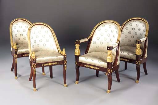 A set of four French ormolu-mounted mahogany chairs