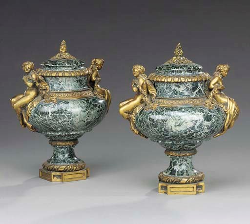 A pair of Napoleon III ormolu-mounted Vert Maurin marble urns and covers