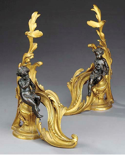 A pair of French gilt and patinated bronze chenets