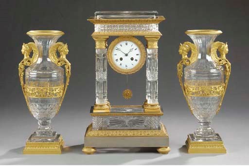 A Napoleon III gilt-bronze and crystal garniture