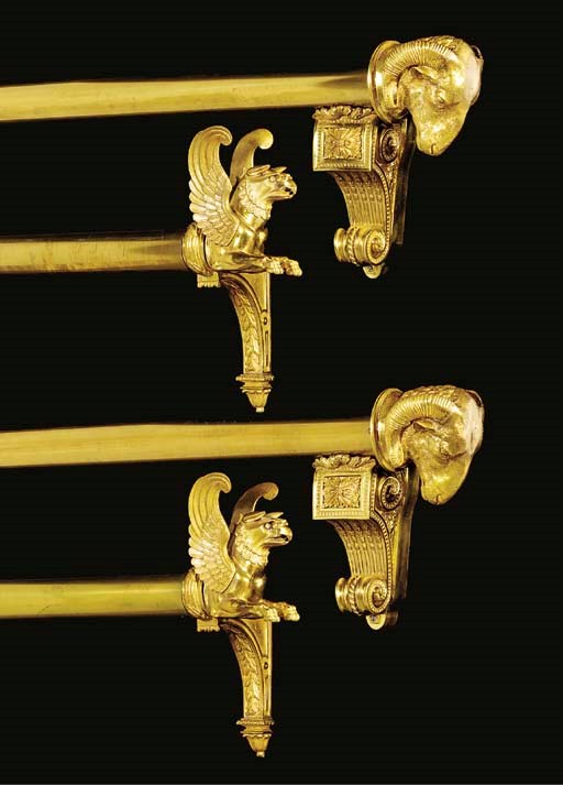 A set of twelve brass and bronze curtain poles