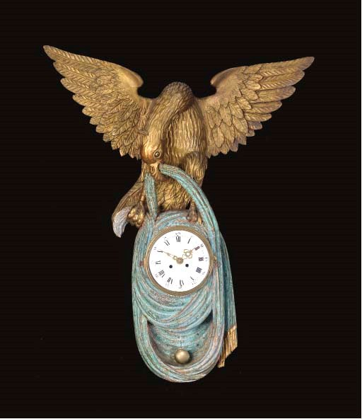 A BALTIC GILTWOOD AND POLYCHROME AND PARCEL GILT WALL CLOCK,