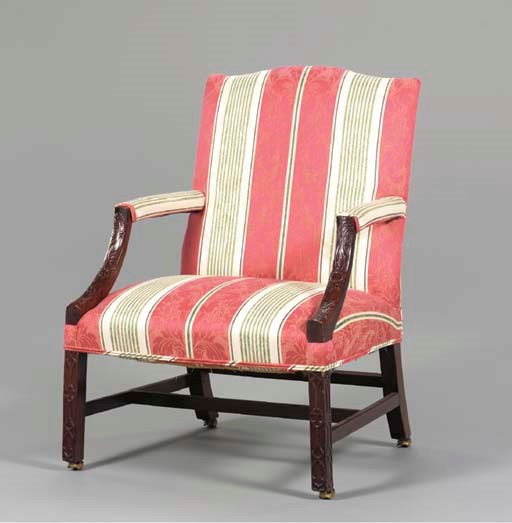 A GEORGE III MAHOGANY LIBRARY ARMCHAIR,