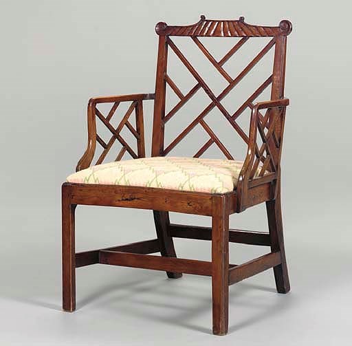 A GEORGE III PROVINCIAL YEW WOOD AND MAHOGANY COCKPEN ARMCHAIR,