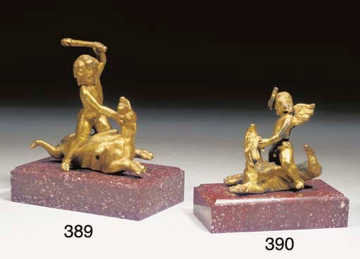 GROUPE EN BRONZE DORE REPRESENTANT CUPIDON AILE CHEVAUCHANT UN MONSTRE MARIN