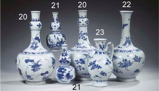 Two Transitional blue and white double gourd vases