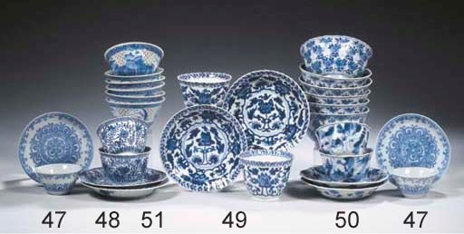 A set of eight cups and saucers