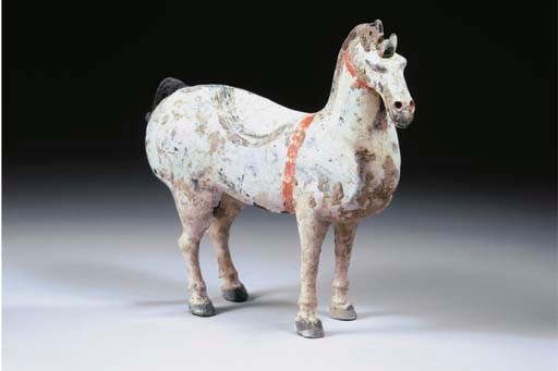 A painted grey pottery figure of a horse