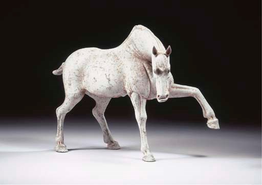A painted grey pottery figure of a horse