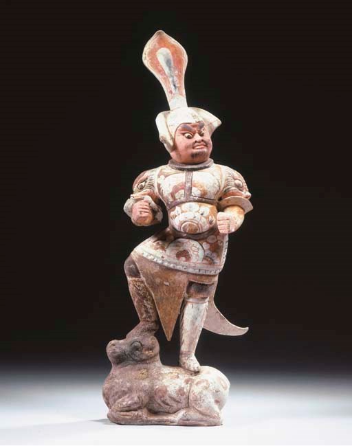 A painted pottery figure of a lokapala guardian