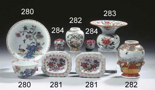 Two famille rose walking stick knobs