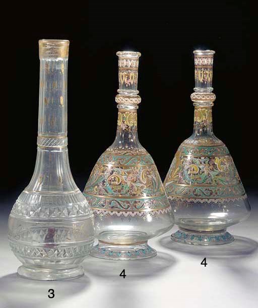 A pair of French enamelled clear glass water bottles, 19th century