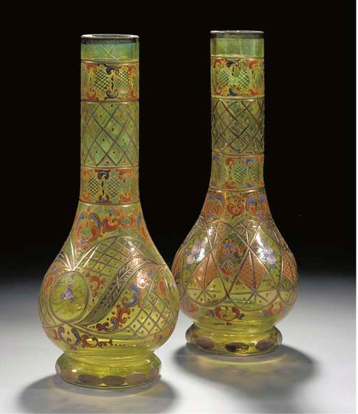 Two similar clear yellow faceted glass bottles, Bohemian 19th Century