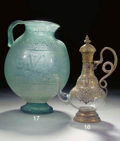 A light green glass acid etched ewer, Syrian 19th Century