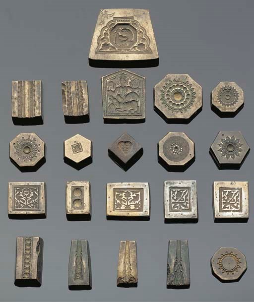 A group of twenty-one bronze jewellery moulds