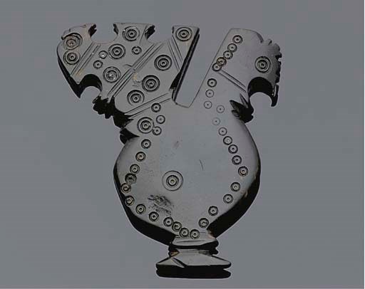 A flattened blackstone scent bottle, Iran/Afganistan, 10th century