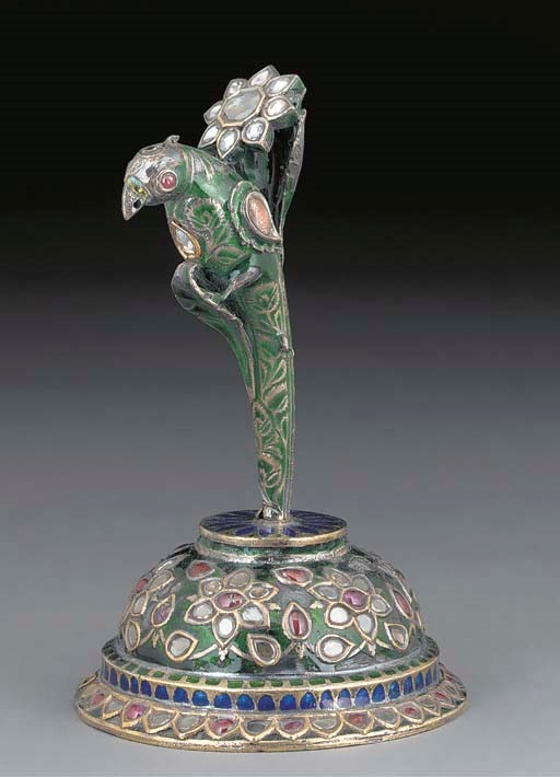 An Indian enamelled and inset silver gilt bird finial, 19th century