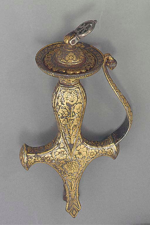 An Indian gold and silver damascened tulwar, 18th century