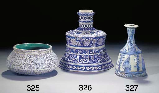 A large blue and white pottery candlestick, 20th century