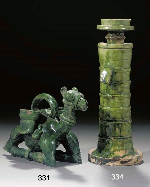 A Chanakkale green glazed model of a camel, 19th century