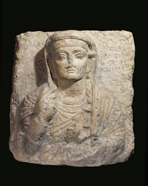 A PALMYRENE LIMESTONE FUNERARY RELIEF WITH FEMALE BUST