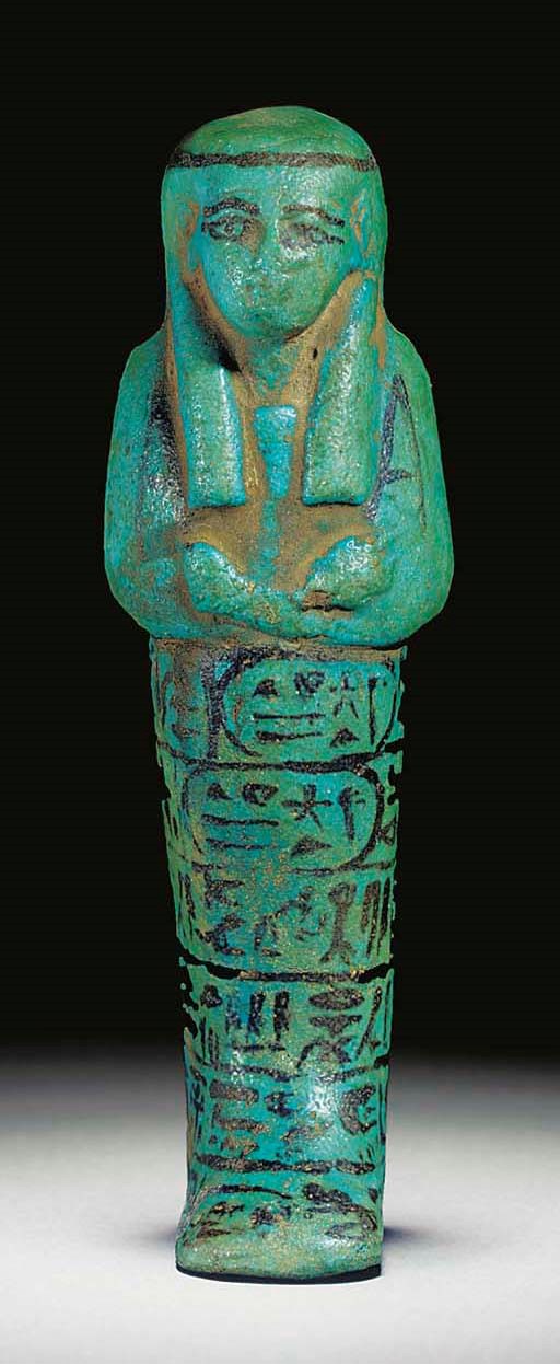 AN EGYPTIAN TURQUOISE-BLUE GLAZED COMPOSITION SHABTI OF THE DIVINE ADORATRICE HENUTAUI