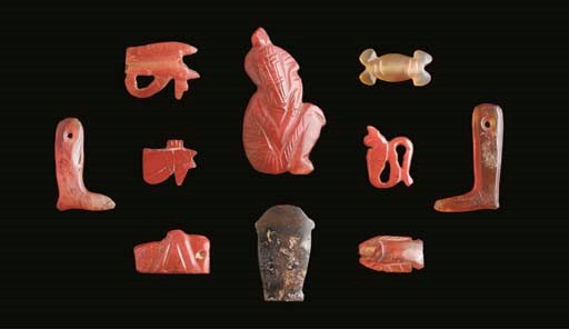 AN EGYPTIAN CORNELIAN AMULET