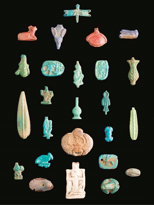 A RARE EGYPTIAN BRIGHT BLUE GLAZED COMPOSITION AMULET OF A DRAGONFLY