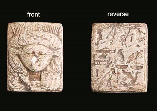 AN EGYPTIAN GREYISH-GREEN GLAZED COMPOSITION NECROPOLIS SEAL