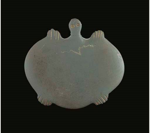 AN EGYPTIAN PREDYNASTIC SLATE TURTLE PALETTE