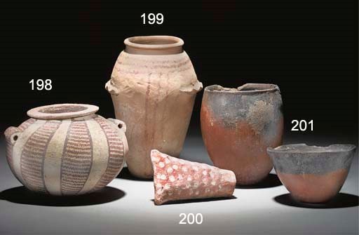 AN EGYPTIAN PAINTED POTTERY 'BAGGY' FUNERARY OFFERING JAR