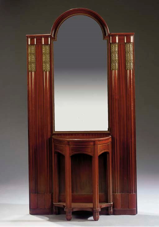 A mahogany veneered hall mirror