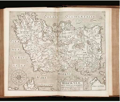 CAMDEN, William (1551-1623).  Britain, or a chorographicall descriptrion of the most flourishing kinjgdomes, London: by F. K[ingston], R. Y[oung], and I. L[egat] for Ioyce Norton, and Richard Whittaker, 1637. 2° (300 x 214mm).  55 engraved maps only (of 57), all but 2 double-page, by William Kip and William Hole mostly after Christopher Saxton and John Norden, and 7 plates only (of 8). (Lacking the engraved title, the maps of Kent and Middlesex, one plate, and 5pp. of index, map of Berkshire with clean long tear, ca. 11 maps shaved with loss, verso of 4G5 stained, Qq1 and H7 with severe but clean tears, lightly browned and spotted.) Contemporary panelled calf over wooden boards gilt, outer and inner panels raised, decorated in gilt and blind with geometrical and floral designs, gilt edges (rebacked with old spine partly relaid, rubbed and scuffed). Second edition of Holland's translation. Chubb XX; STC 4510.2. Sold not subject to return.