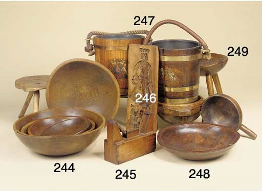 A group of five sycamore and beech graduated dairy bowls
