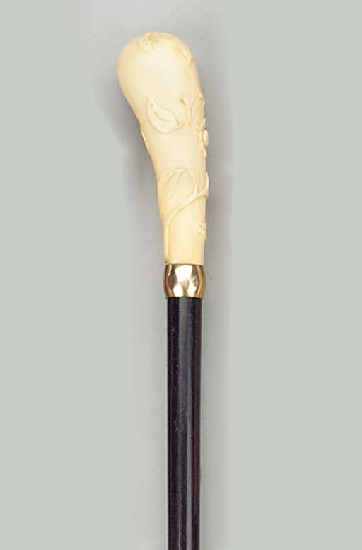 A Continental ivory mounted hardwood cane