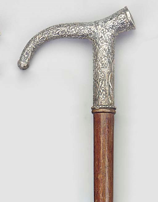 An Anglo-Indian silver mounted hardwood walking stick