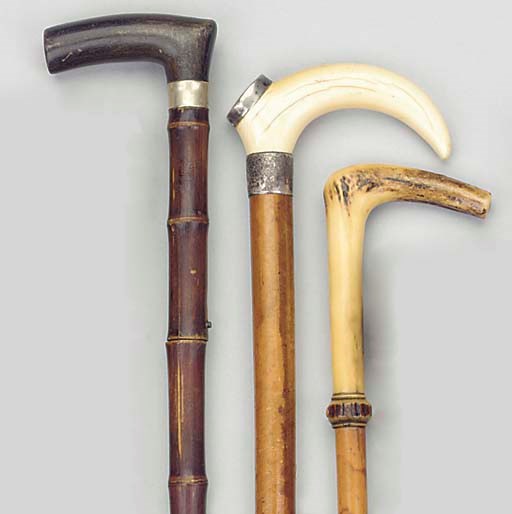A Victorian ivory and silver mounted malacca walking stick