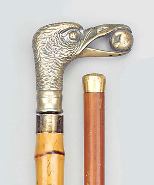 A CONTINENTAL SILVERED BRASS MOUNTED BAMBOO SWORD STICK