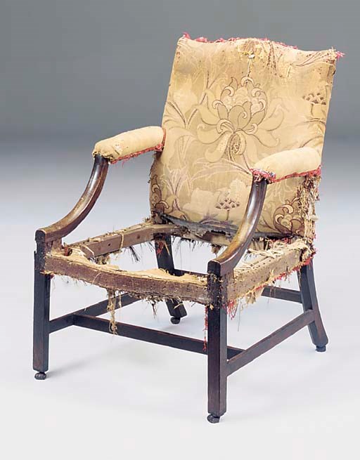 A GEORGE III MAHOGANY OPEN ARM LIBRARY CHAIR