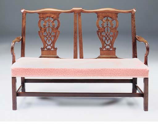 A MAHOGANY TWIN CHAIRBACK SETTEE