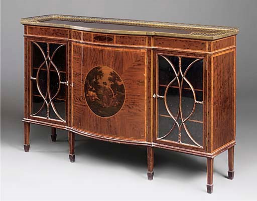 A PLUM PUDDING MAHOGANY AND TULIPWOOD CROSSBANDED DISPLAY SIDEBOARD