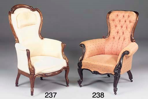 A VICTORIAN WALNUT AND DEEP BUTTONED EASY CHAIR