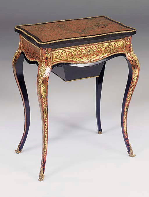 A NAPOLEON III EBONISED SCARLET TORTOISESHELL AND BRASS INLAID WORK TABLE