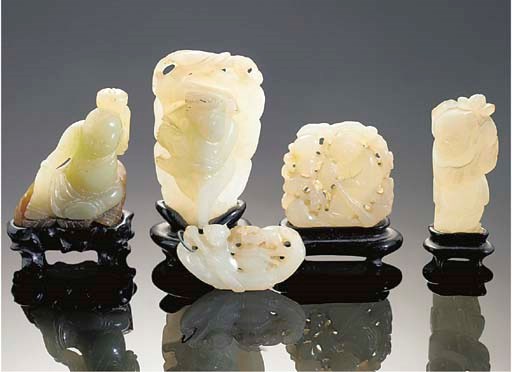A group of five celadon jade carvings, mostly 18th century