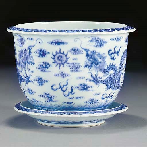 A blue and white jardiniere and stand, 19th century, Kangxi six character mark