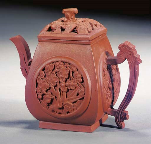 An Yixing teapot and pierced cover, early 18th Century