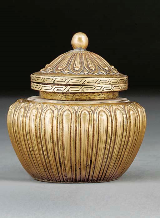 A Tibetan gilt copper jar and cover, 18th Century